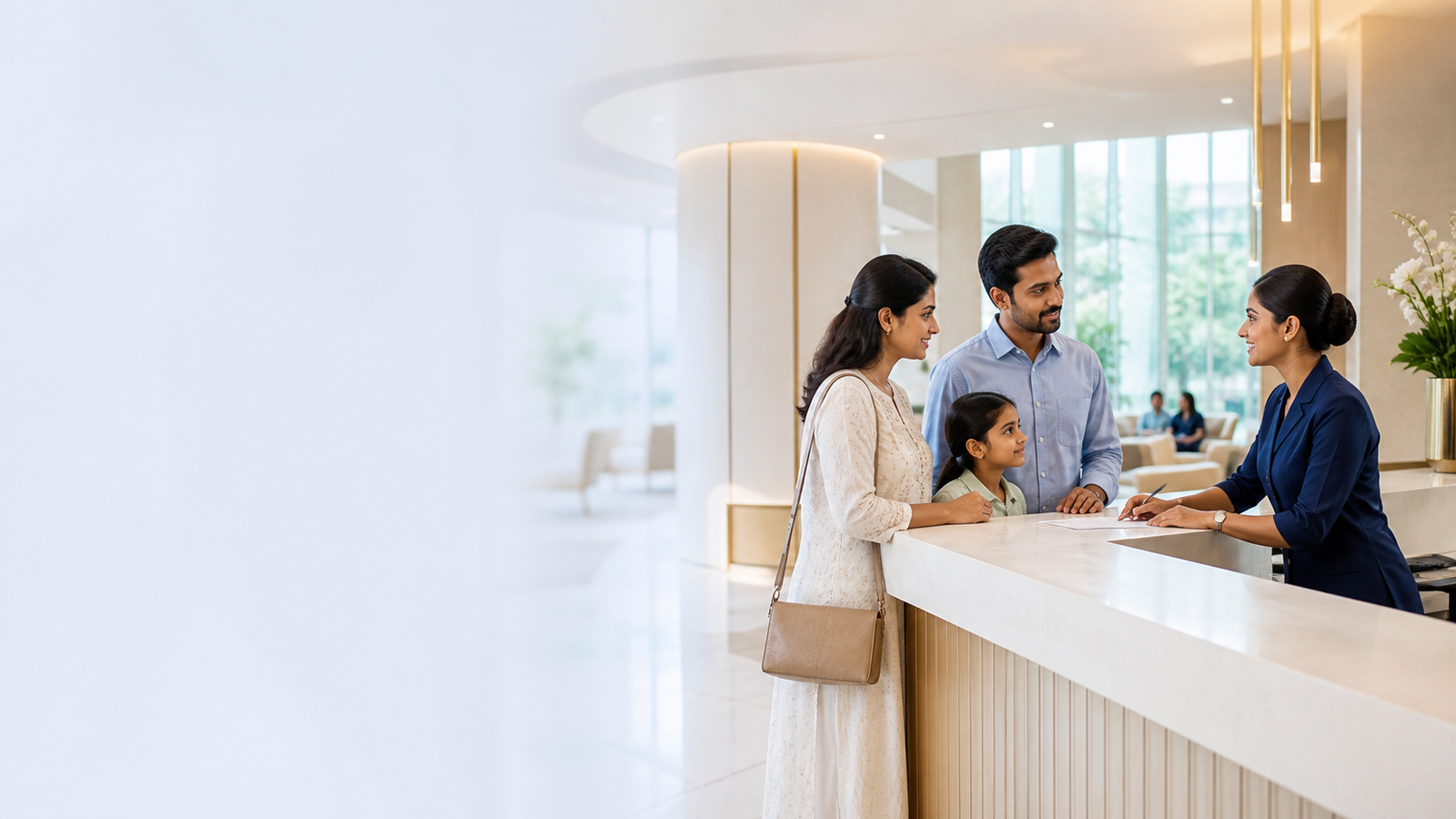 Apaxis Hospitals patient care coordinator assisting a family at the reception